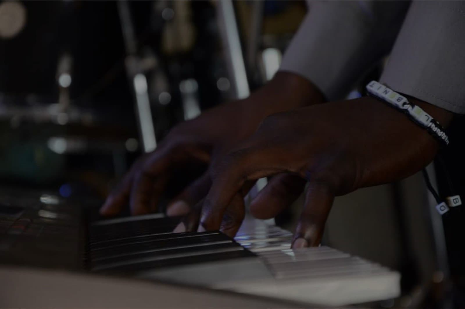 Hands playing keys
